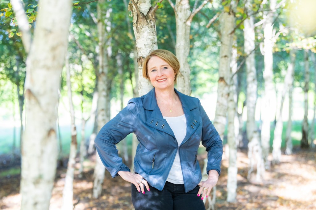 Zoë catching secrets from birch trees (Image and caption credit: Zoë Routh)