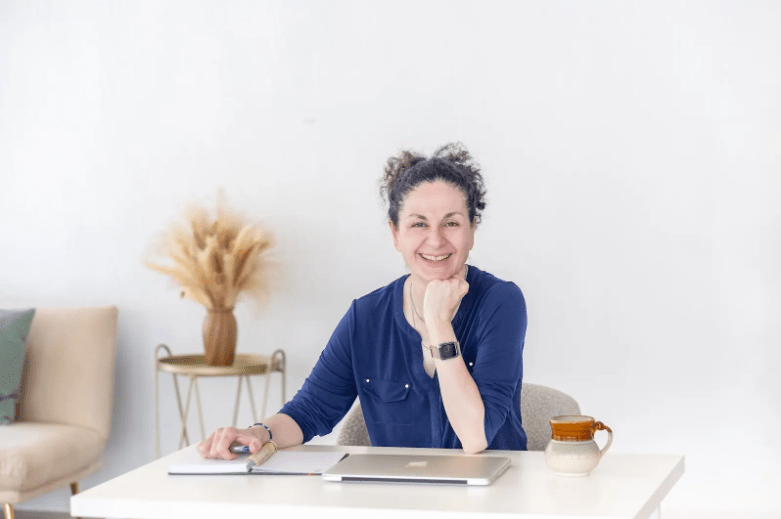 Nil Demircubuk Sitting at Desk - Nil Demircubuk